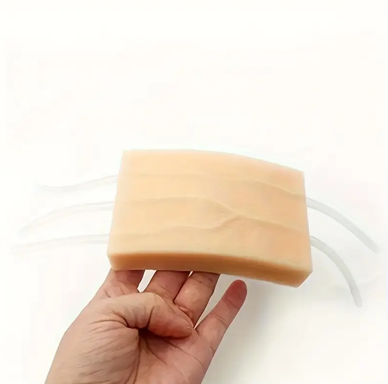 Realistic Silicone Practice Pad with syringes to mimic blood flow or injection practice